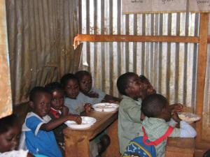 Hamomi Childrens Centre students enjoy a solar meal in their classroom