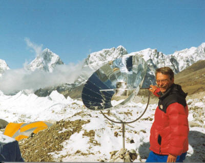 Allart Ligtenberg boils water on Mount Everest using a collapsible parabolic cooker he developed for use by trekking groups
