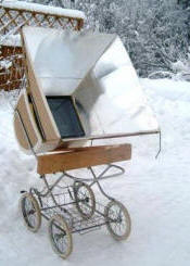 A baby carriage keeps the SunStar out of the snow and angled towards the sun