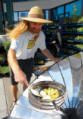Bart Orlando solar cooks a vegetable stir fry dish outside the Arcata Co-op (photo: Tyson Ritter)