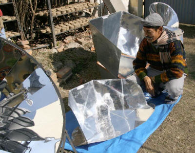 Sanu Kaji Shrestha and FoST promote several types of solar cookers, as well as fuel-efficient stoves that burn special briquettes made from agricultural and industrial waste